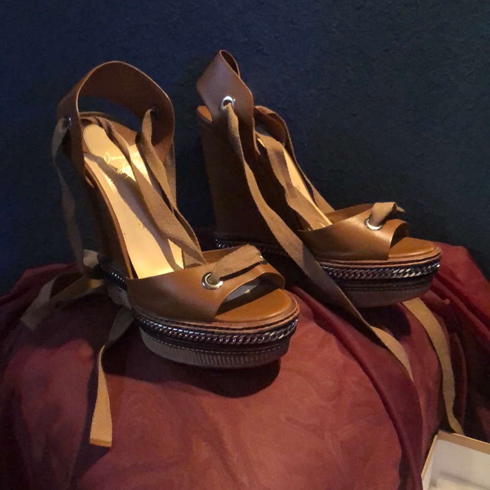 Brand New Christian Louboutin  red bottoms wedges. Tie strap